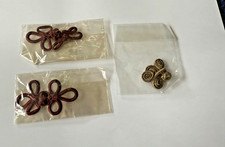 3 frog fasteners in packaging