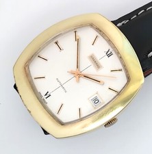 21 JEWELS SWISS MADE GARRARD