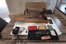 Singer Vintage Electric Sewing Machine 201K  in excellent condition.