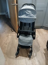 Puggle travel stroller with easy one hand fold