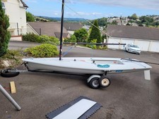 LASER 1 (ILCA) sailing dinghy. Includes launch trolley and road trailer.