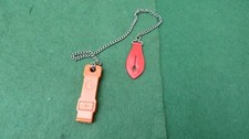 VINTAGE LIFE JACKET PERRY WHISTLE WITH S.O.S  ON ONE SIDE BY PERRY & CO