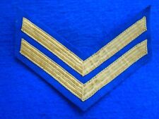 BRITISH MILITARY CORPORALS GOLD BRAID STRIPES ON ROYAL BLUE, CHEVRONS