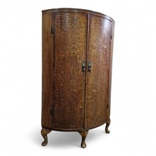 Antique Oak corner cupboard / floorstanding bow front cabinet on cabriole legs
