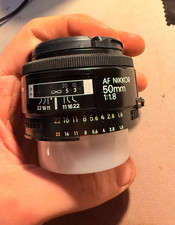 Nikon NIKKOR 50MM AF f/1.8 prime lens, excellent condition.
