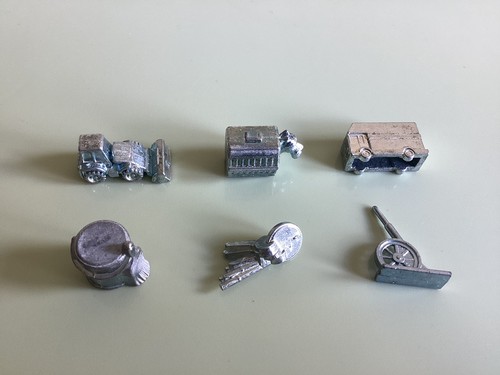 Silver metal pieces - (six),