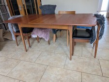 Extending dining table. S Form