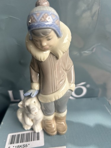 Lladro eskimo boy with pet - boy,