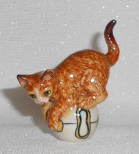 CAT PLAYING ON BALL  Porcelain