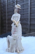 Vintage Collectors Auro Belcari 's Lady Walking Dog Figurine sculpture 1985s
