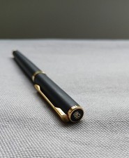 Navy and Gold Slimline Fountain Pen. Takes cartridges. Messenger brand.