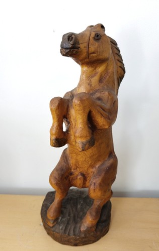 Large wooden horse sculpture