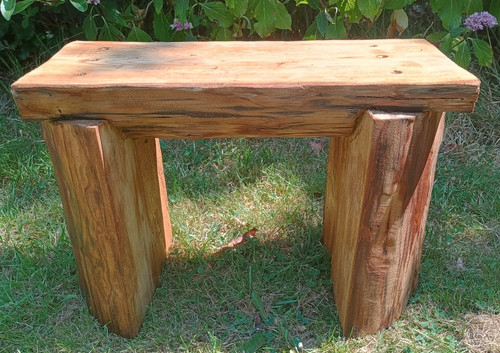 Handmade log bench for one