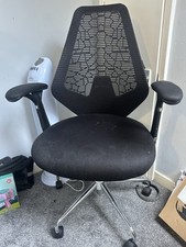 Staples Black Swivel Office Chair with Lumber Support and Head Neck Rest