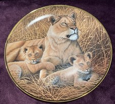 African Lioness and Cubs