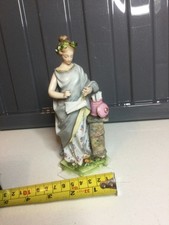 Meissen Roman Lady Figurine Porcelain Figure - slight damage. Scroll broken.