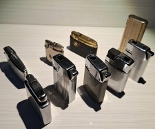 9x Vintage rare Butane pocket lighters sold for repair/parts