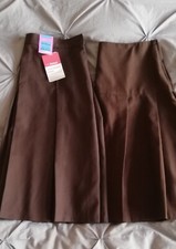 2 Brown pleated school skirts, similar sizes, approx age 14-15