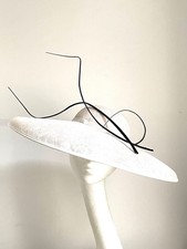 large off white saucer disc