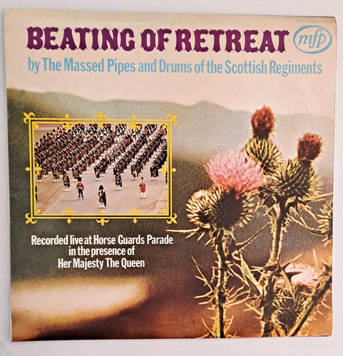 Beating retreat the massed - of,