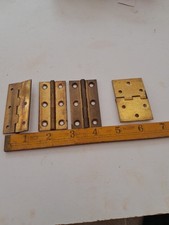 old brass hinges,4number, been in storage,