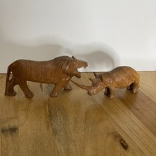 Hand carved wooden animals lion rhino african