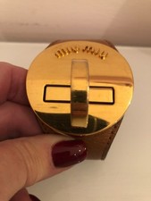 Authentic MIU MIU Gold metal and tan leather bracelet