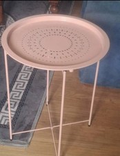 This pink, circular piece is a