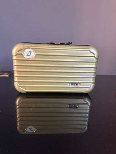 Rimowa metallic green amenity - rimowa,