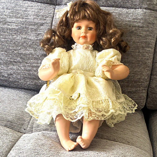 Porcelain girl doll brown - porcelain,