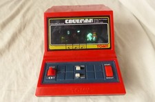 Vintage TOMY CAVEMAN Handheld Electronic Game Tabletop VFD Computer Working 1982