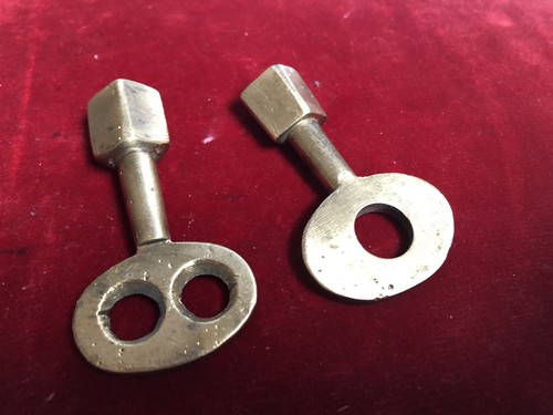 Antique brass barrel tap keys