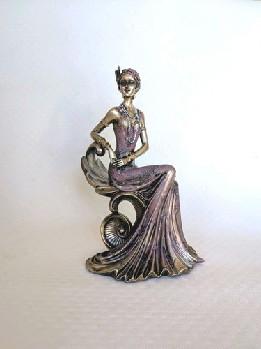 Art deco style seated flapper - art,