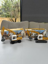Pair of 914 Liebherr Excavator
