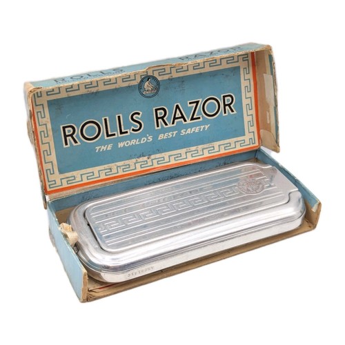 Vintage early rolls - rolls, razor