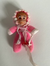 Vintage Matchbox Monkey Bean Doll pink romper baby suit & hood. 7cm. Collectible