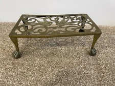 Antique brass trivet (or