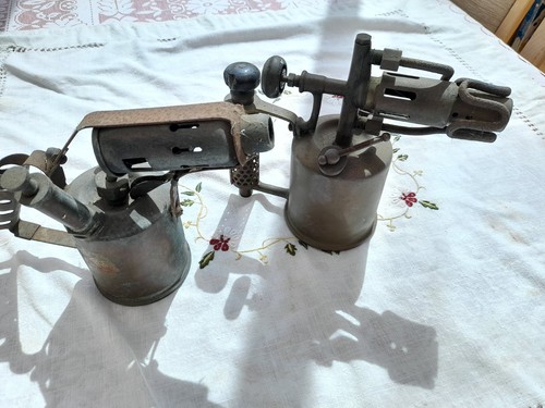 Old brass blow lamps - old,