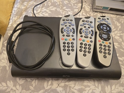 Sky box with remotes - with, +
