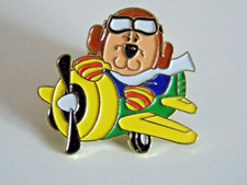 Macmillan cancer relief pin - relief,