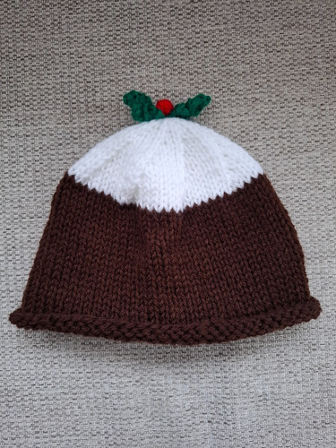 Hand knitted christmas pudding - hand,