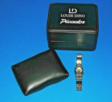 WristWatch. Picador, Louis Dino. White metal strap. Analogue face. Battery req'd