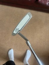 Odyssey White Hot #1 Putter with SuperStroke grip and a custom odessy headcover