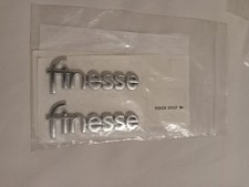 Ford Fiesta MK4 (1999-2002) Finesse Wing Badge Kit.Genuine Ford new old stock.