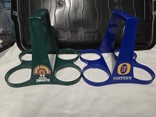 I Have Two Four Pint Beer Holders 1 Fosters And 1 John Smiths
