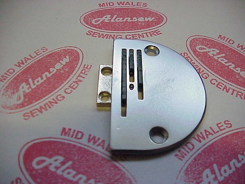 Needle plate rubber feed dog - plate, &