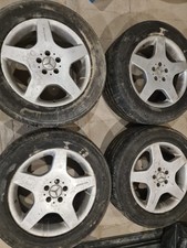 4x MERCEDES 18 9J ET52  AMG Alloy Wheels W163 ML55 with 4x Continental m+s tyres