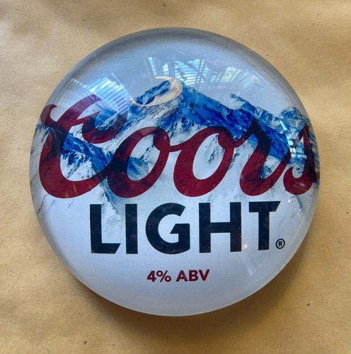Coors light lager - round, fish