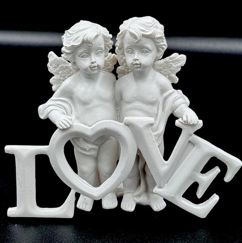 Cherub couple standing with - cherub,