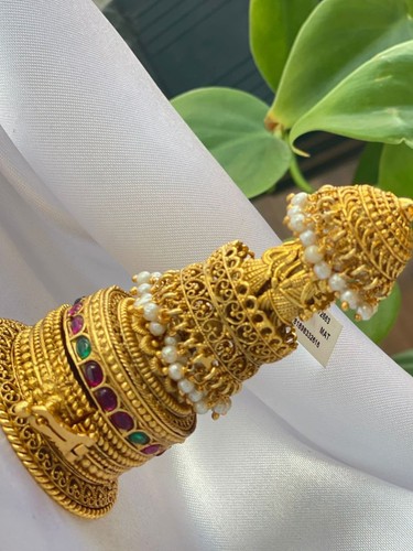 Handcrafted gold tone temple - tone,